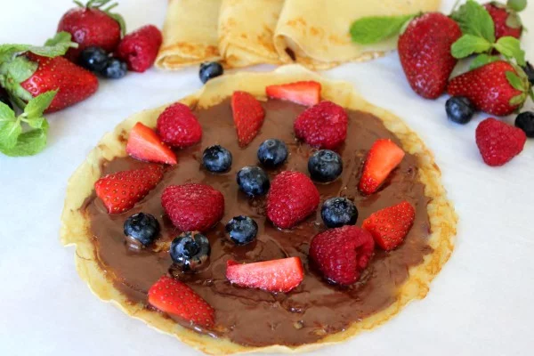 Nutella and Berry filled Crepes #crepes #recipe #dinner