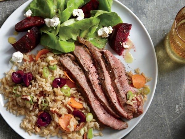 Grilled Flank Steak with Cherry-Pecan Rice #steak #recipe #dinner