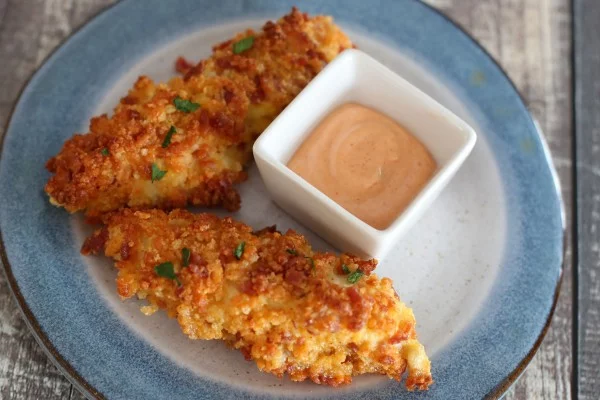 Elevate Everyday Chicken Fingers With a Bacon Cheddar Coating #superbowlparty #snacks #recipe