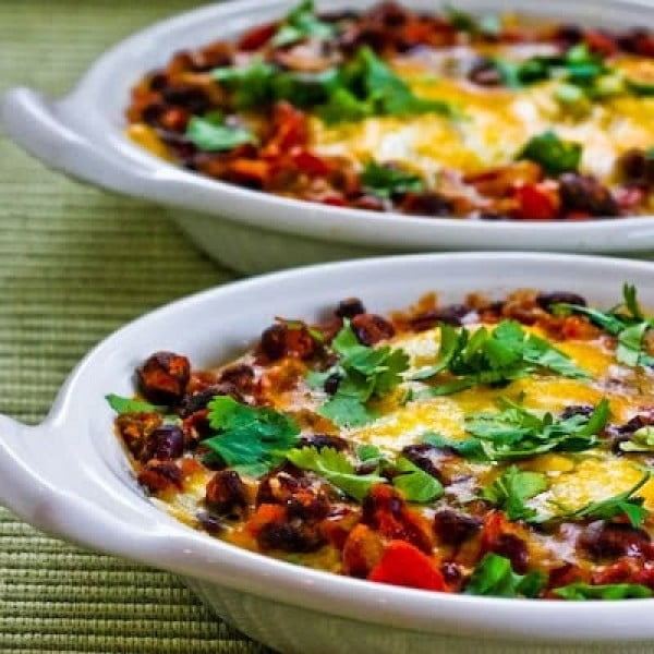 Mexican Baked Eggs with Black Beans, Tomatoes, Green Chiles, and Cilantro #recipe #eggs #breakfast