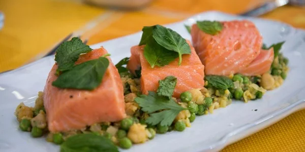 Poach fresh salmon in flavorful olive oil for perfectly cooked fish #chickpea #healthy #dinner
