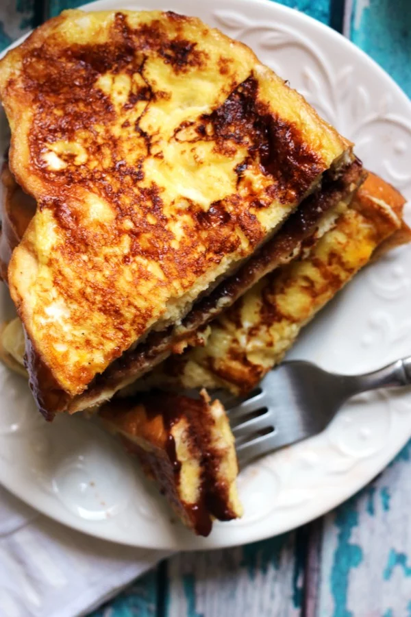 Hazelnut-Cocoa Mascarpone Stuffed French Toast Sandwiches #breakfast #frenchtoast #recipe