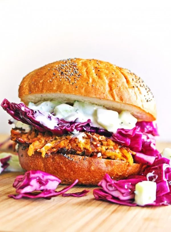 Carrot tahini quinoa veggie burger with tzatziki and purple slaw #burgers #healthy #recipe #lunch #dinner