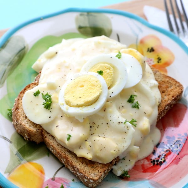 Creamed eggs on toast {easy recipe using hard boiled eggs} #recipe #eggs #boiled #breakfast #snack