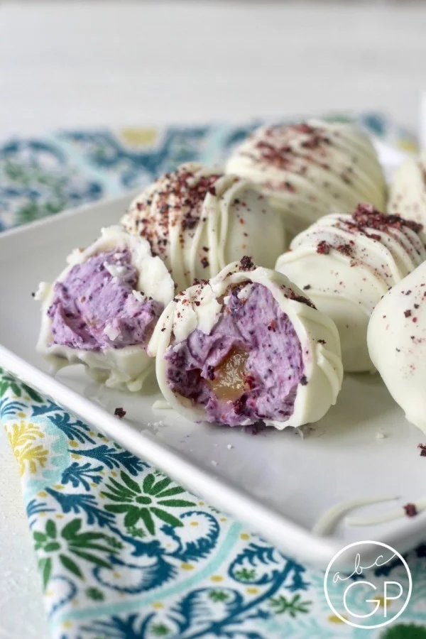 Lemon-Filled Blueberry Cheesecake Truffles #lemon #dessert #recipe